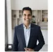 Happy corporate client reviewing private investigation and background verification services